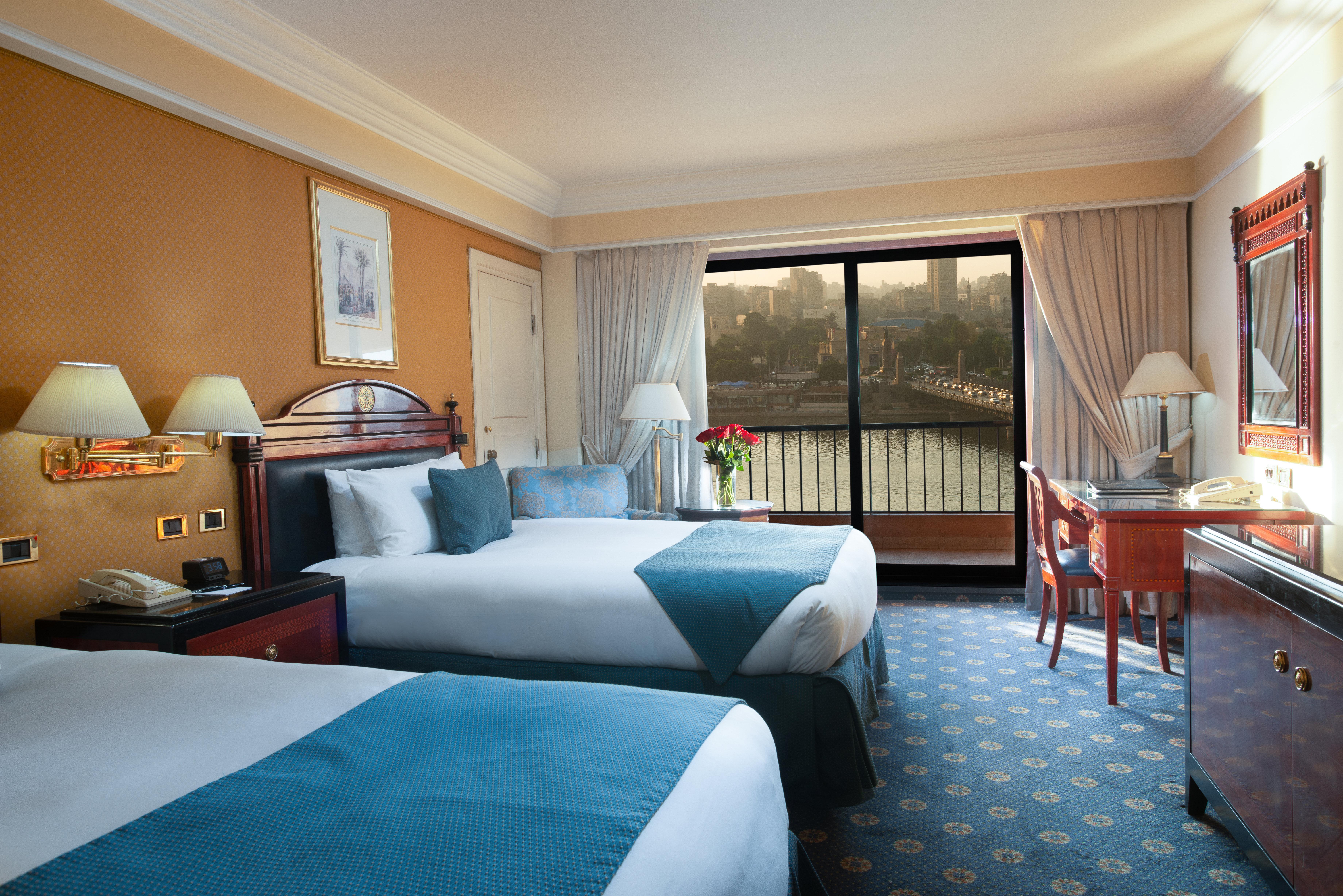 Intercontinental Cairo Semiramis By Ihg Hotel Luaran gambar A room at the Nile Ritz-Carlton